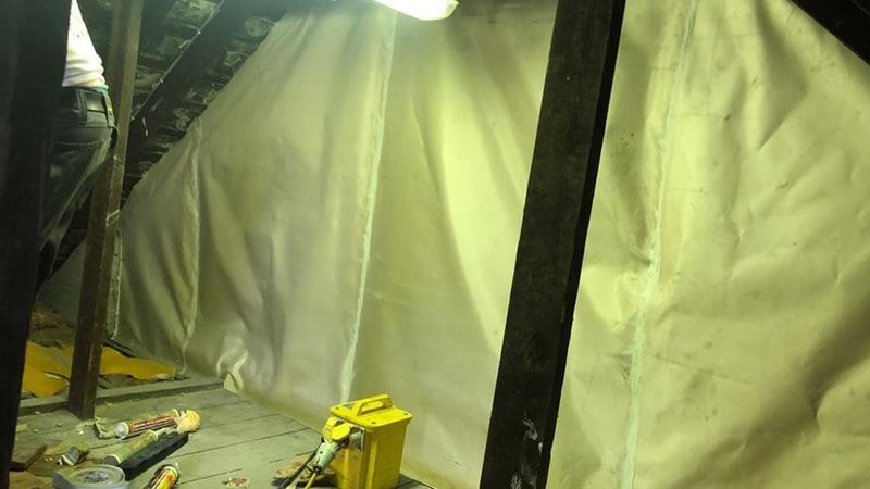 fire protection curtain in roof space void